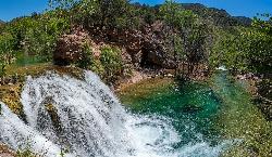  A large, natural waterfall on Fossil Creek is the destination of an easy, one mile hike on Waterfal courtesy of Deborah Lee Soltesz of Coconino National Forest↗